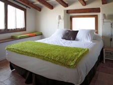 slaapkamer in een van de appartementen