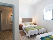 Één van de kamers met extra bed